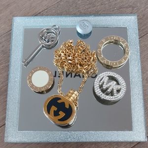 Vintage 90s Gucci perfume bottle pendant